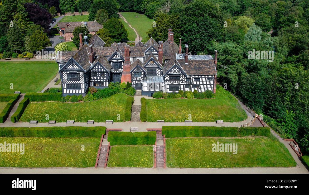 Aerial view of the 14th century Tudor buildings of Bramhall Hall in
