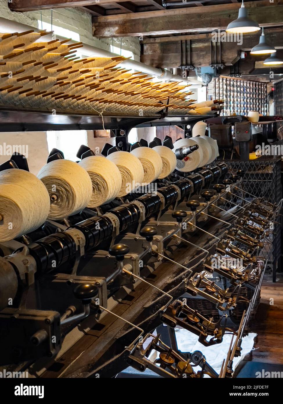 Quarry Bank Mill (also known as Styal Mill) in Styal, Cheshire, in northwest England. It is one of the best preserved textile factories of the Industr Stock Photo
