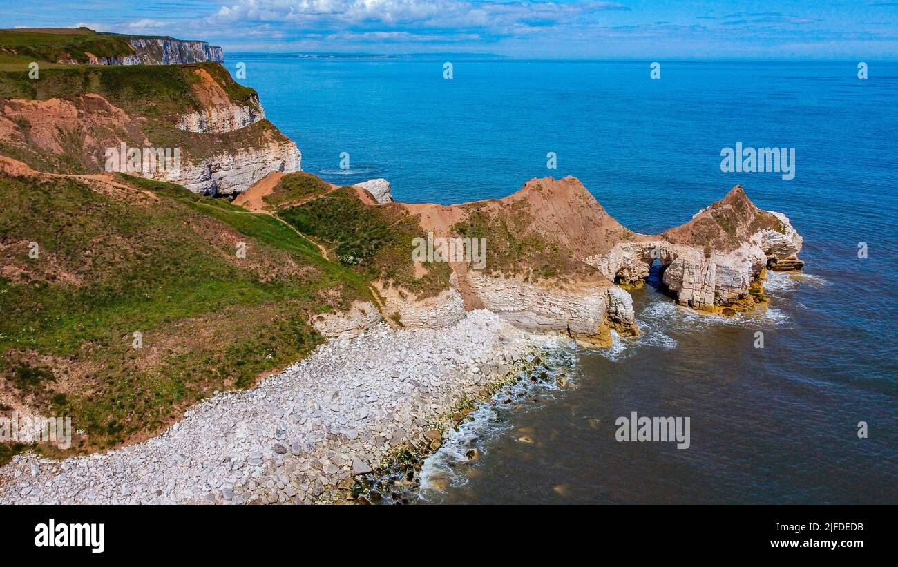 Aerial view of the natural arch and cliffs at Thornwick Bay near Flamborough Head in Yorkshire on the northeast coast of England. Stock Photo
