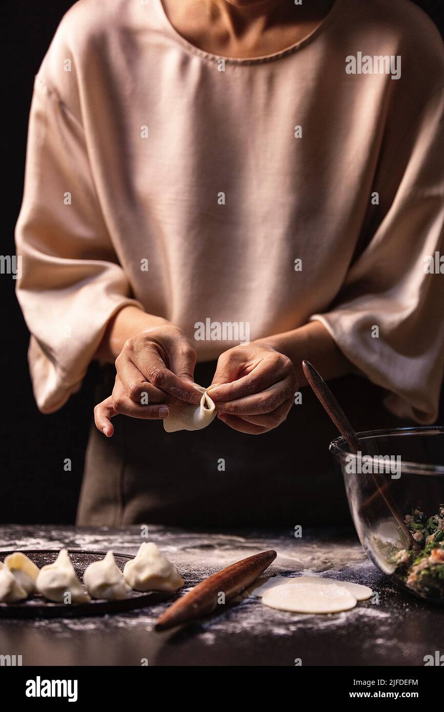 Wrapping dumplings, the process of making traditional Chinese food