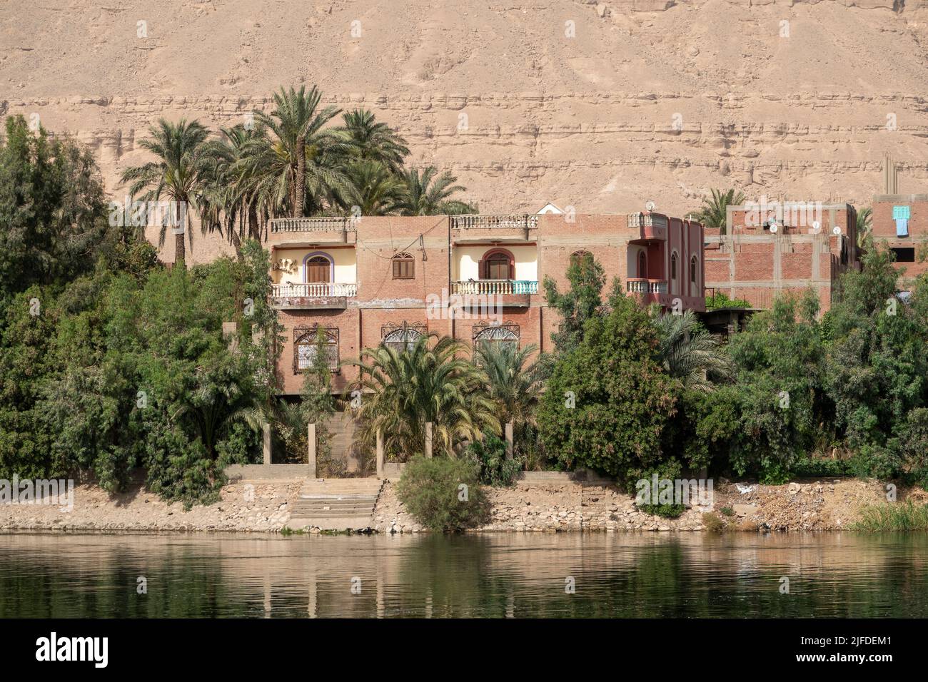 Domestic property on the banks of the river Nile, Egypt Stock Photo