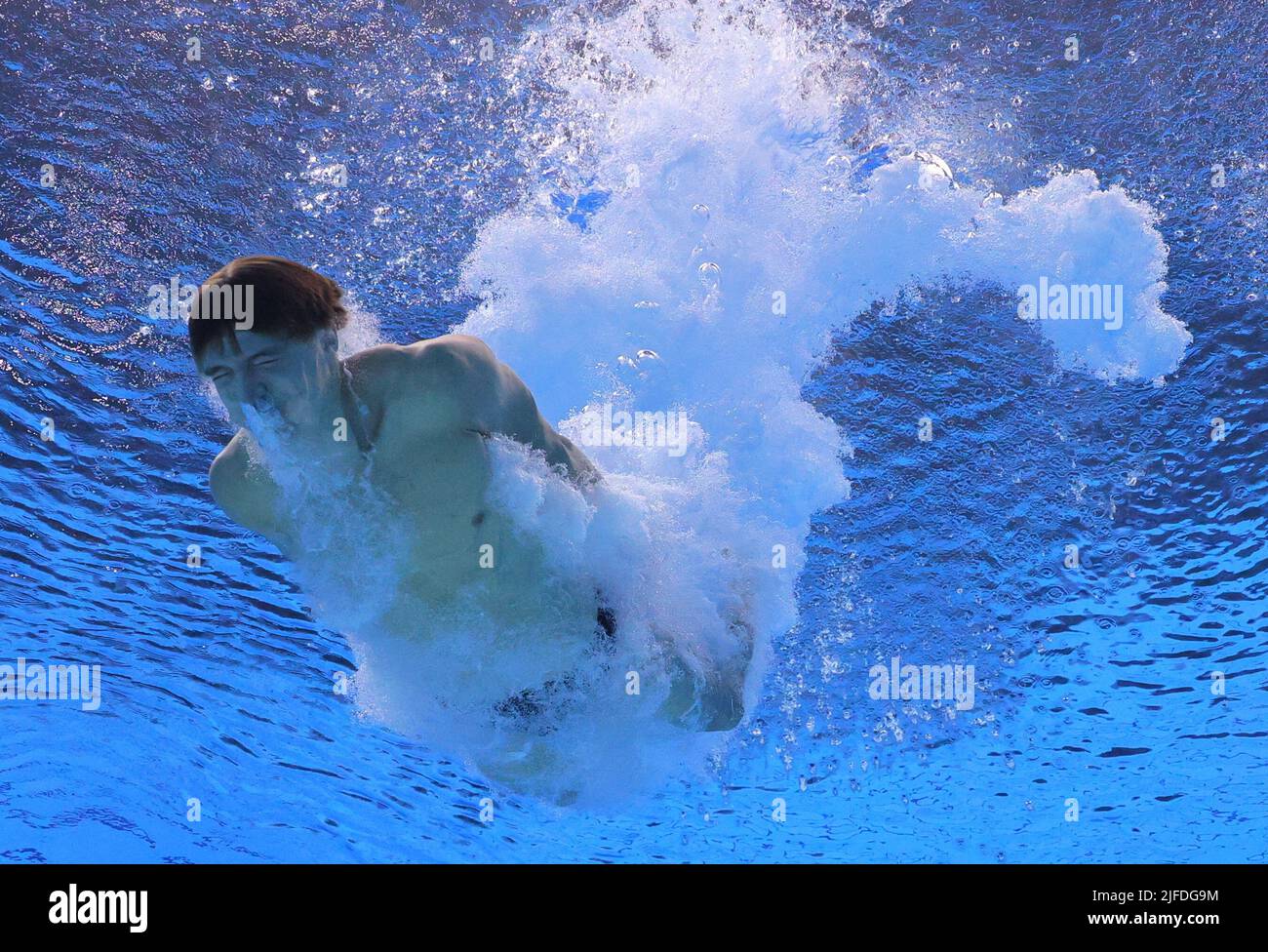 Diving - FINA World Championships - Duna Arena, Budapest, Hungary - July 2, 2022 Canada's Ryaln Wiens in action during the men's 10m platform preliminary REUTERS/Antonio Bronic Stock Photo