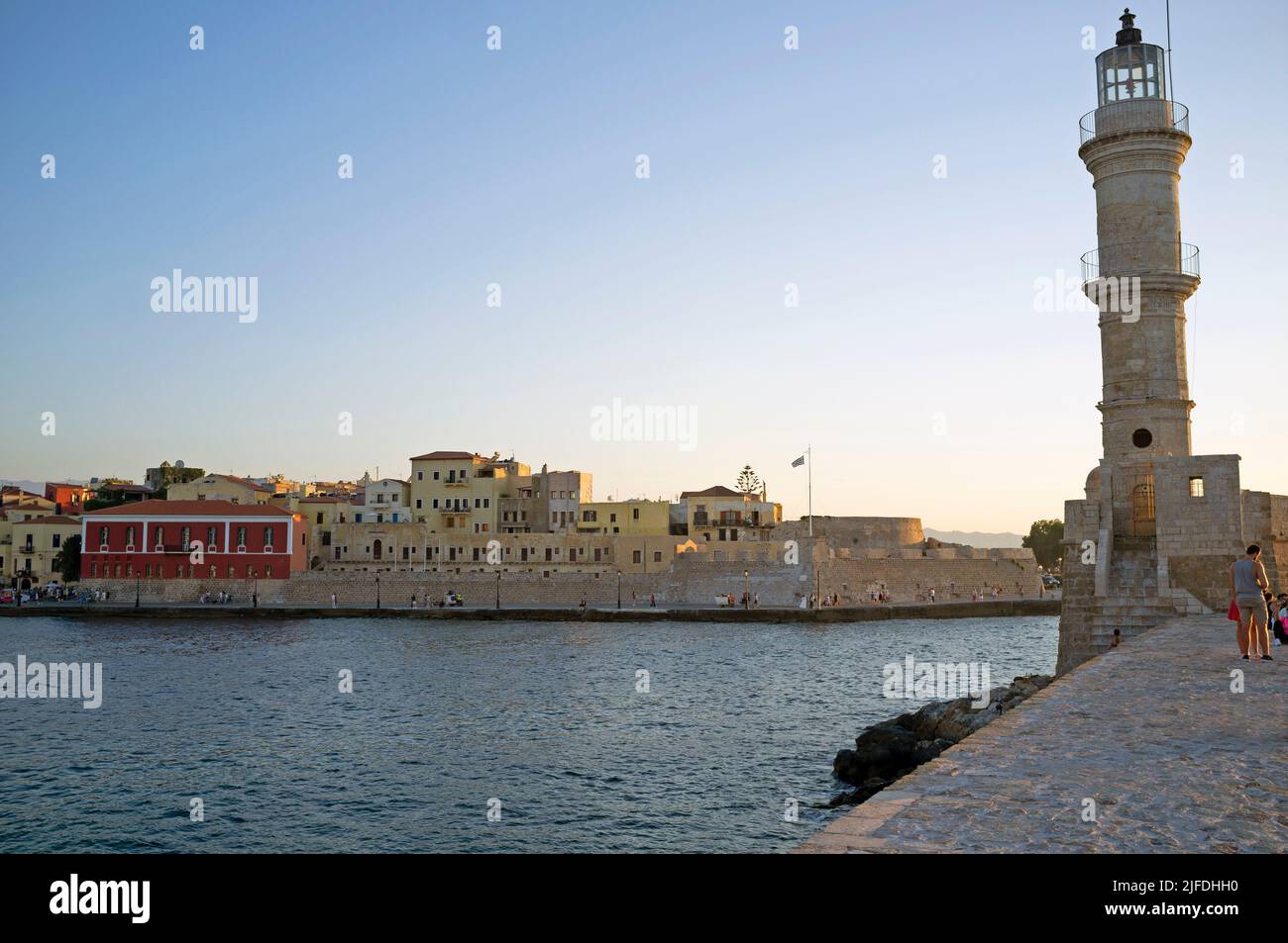 The lighthouse in the old Venetian harbour of Chania, Crete Stock Photo