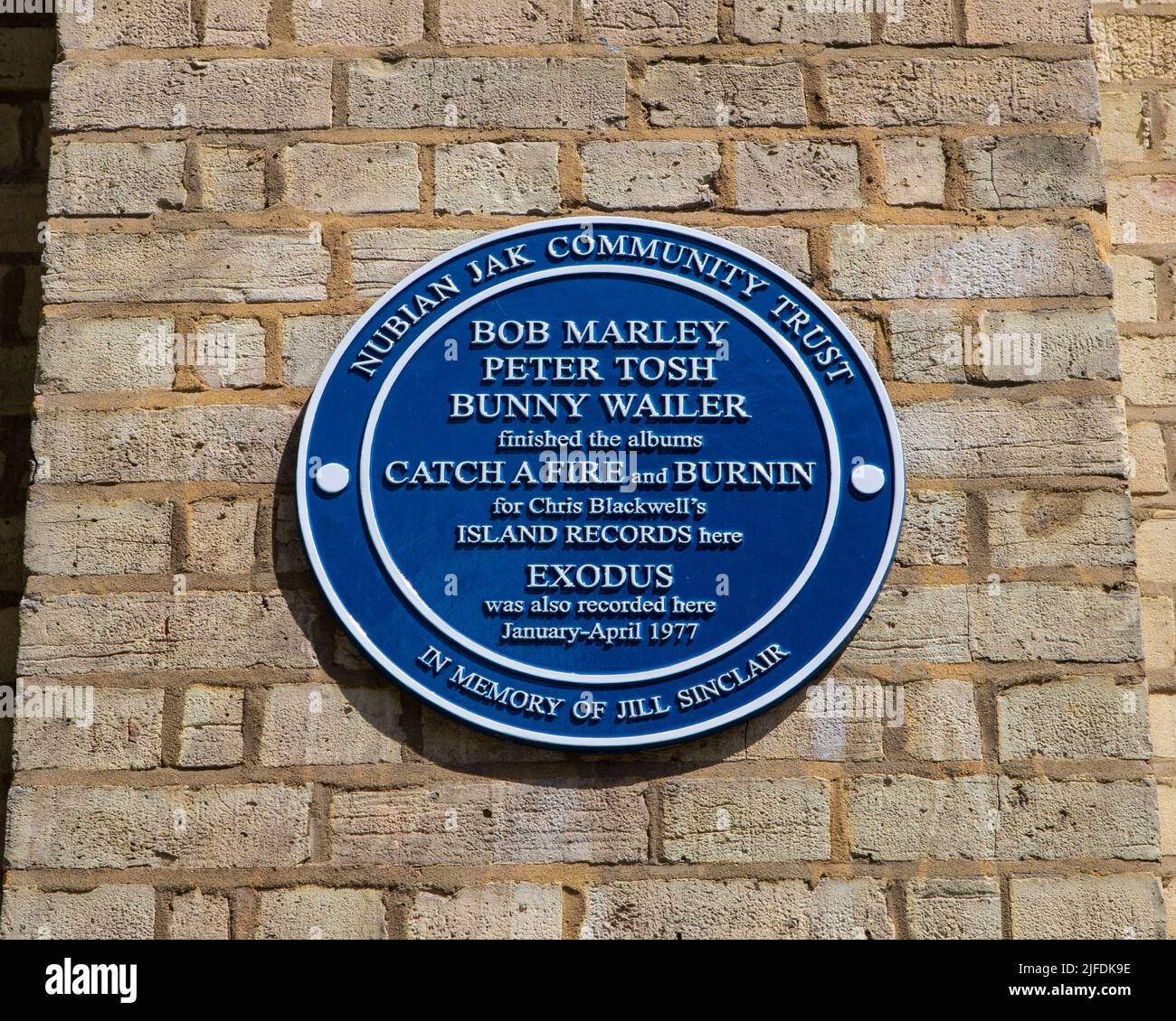 London, UK - May 5th 2022: A plaque on Basing Street in London, UK, marking the location where Bob Marley, Peter Tosh and Bunny Wailer recorded music. Stock Photo
