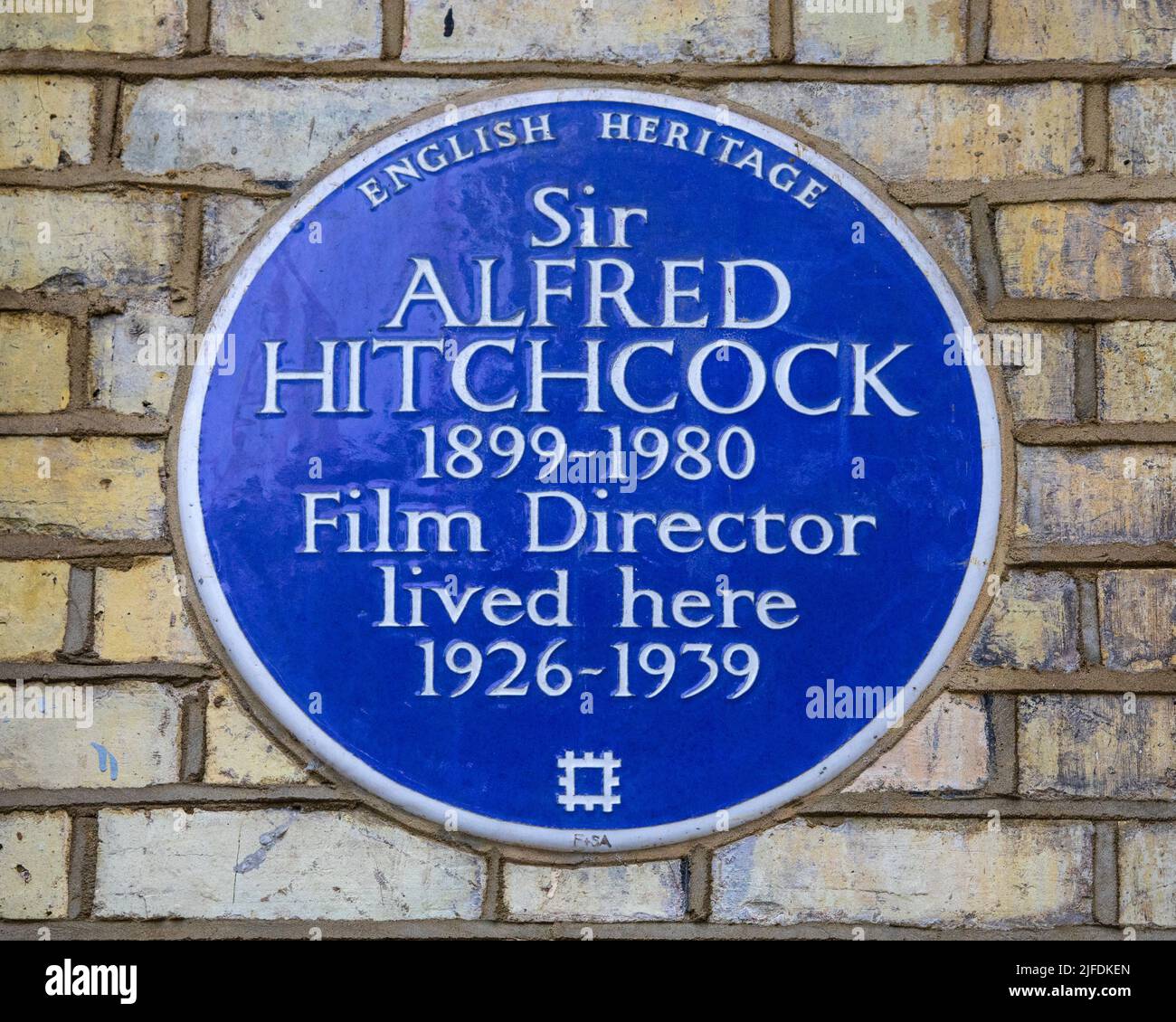 London, UK - May 5th 2022:A blue plaque on Cromwell Road in South Kensington, London, marking the location where famous Film Director Sir Alfred Hitch Stock Photo