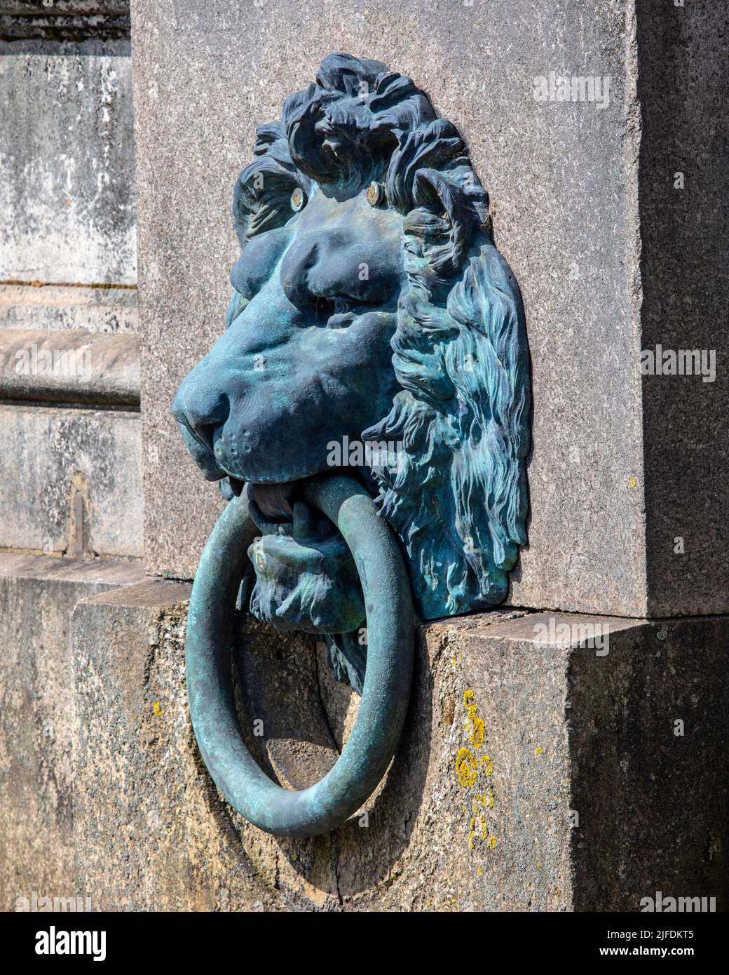 An ornate Lion head mooring ring on the River Thames in central London, UK. Stock Photo
