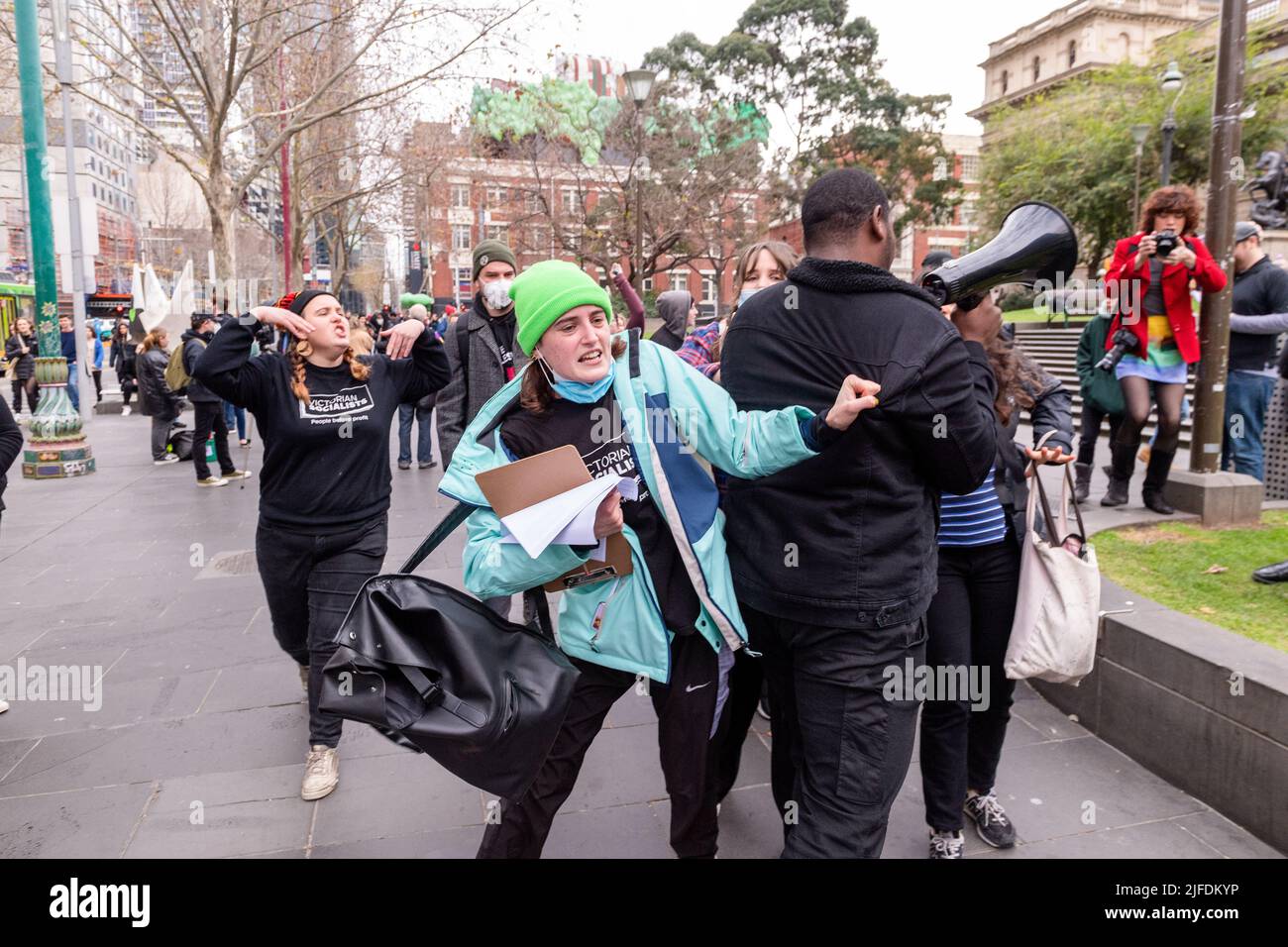 Melbourne, Australia, 2 July, 2022. A Christian anti-abortion activist is pushed by pro-choice demonstrators during a pro-choice protest in Melbourne that was held in reaction to the US Supreme Court's decision to overturn Roe v. Wade and abolish the constitutional right to abortion in the USA. Credit: Michael Currie/Speed Media/Alamy Live News Stock Photo