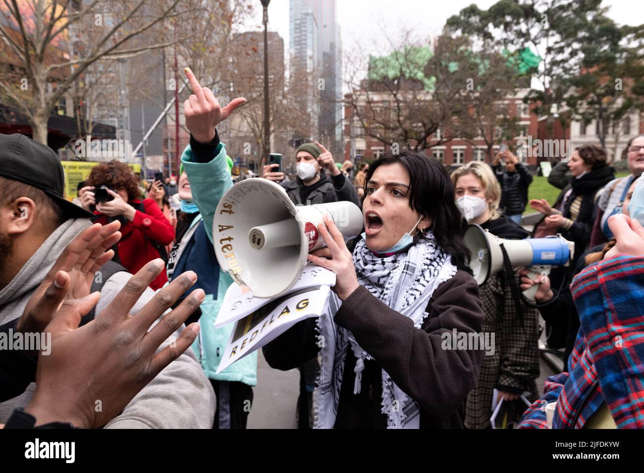 Melbourne, Australia, 2 July, 2022. Pro-choice demonstrators chant through megaphones during a pro-choice protest in Melbourne that was held in reaction to the US Supreme Court's decision to overturn Roe v. Wade and abolish the constitutional right to abortion in the USA. Credit: Michael Currie/Speed Media/Alamy Live News Stock Photo