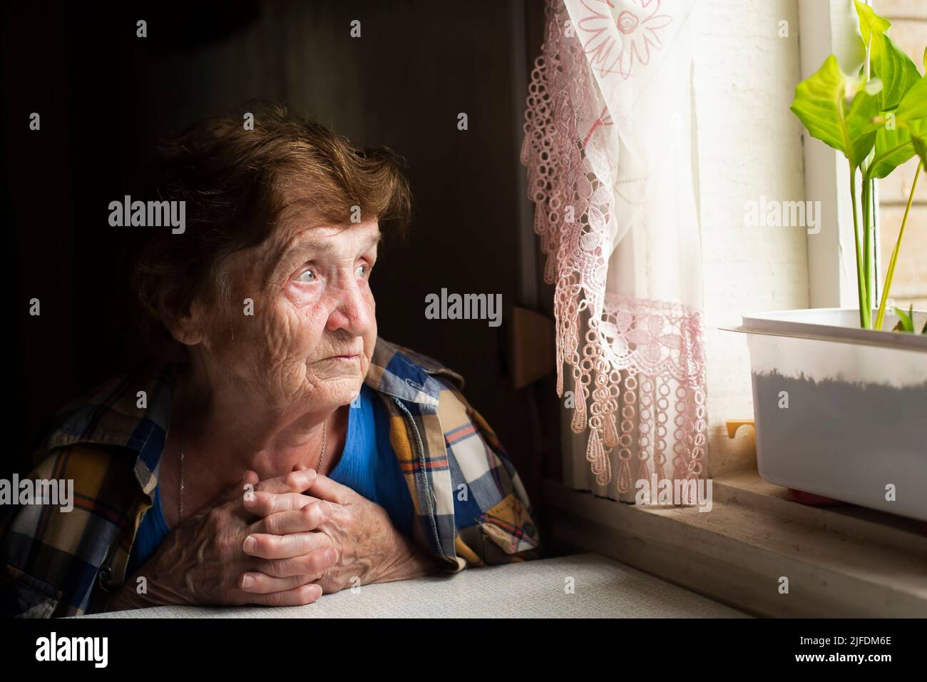 Very old woman lonely sad hi-res stock photography and images - Alamy