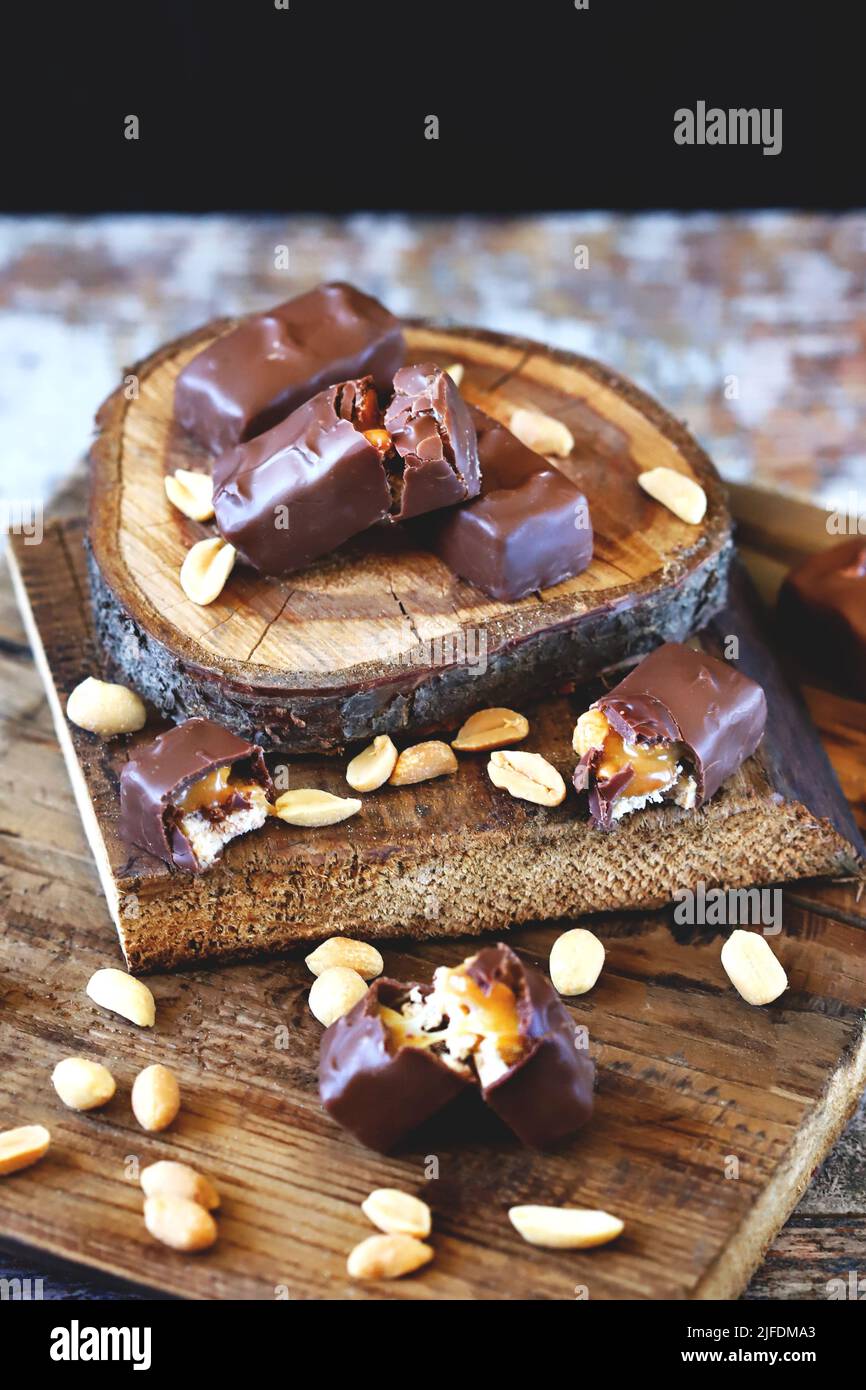 Chocolate bars with peanuts and caramel Stock Photo Alamy