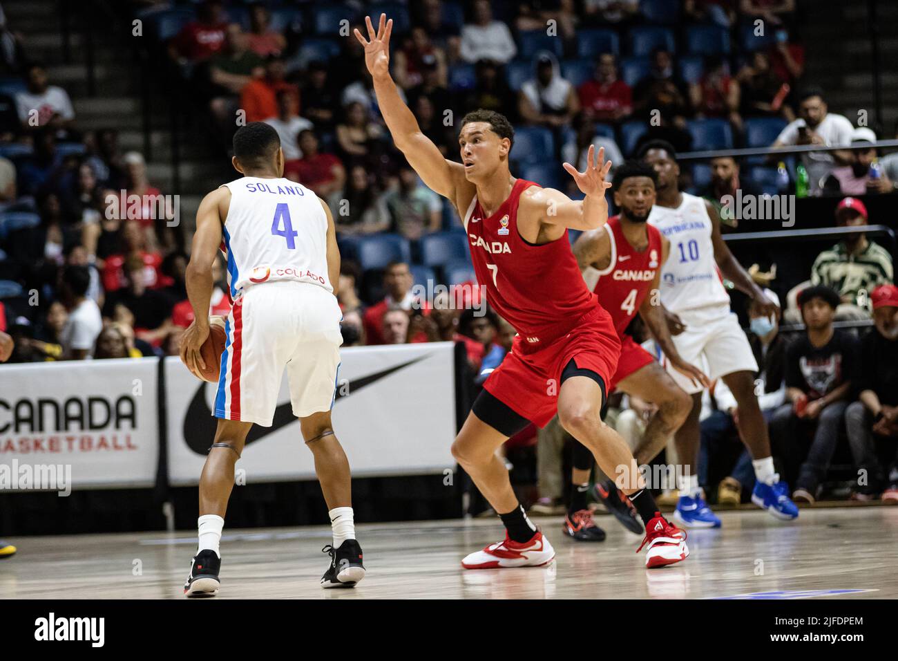 Hamilton, Canada, July 01, 2022: Dwight Powell (R) of Team Canada in defense during the FIBA World Cup qualifying game (Window 3) against Team Dominican Republic at First Ontario Centre in Hamilton, Canada. Canada won the game with the score 95-75. Credit: Phamai Techaphan/Alamy Live News Stock Photo