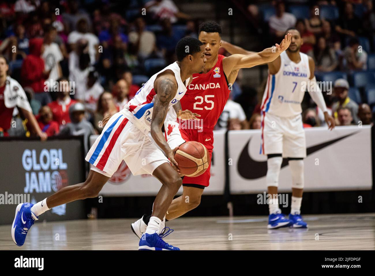 Hamilton, Canada, July 01, 2022: Trae Bell-Haynes (red) of Team Canada in defense during the FIBA World Cup qualifying game (Window 3) against Team Dominican Republic at First Ontario Centre in Hamilton, Canada. Canada won the game with the score 95-75. Credit: Phamai Techaphan/Alamy Live News Stock Photo