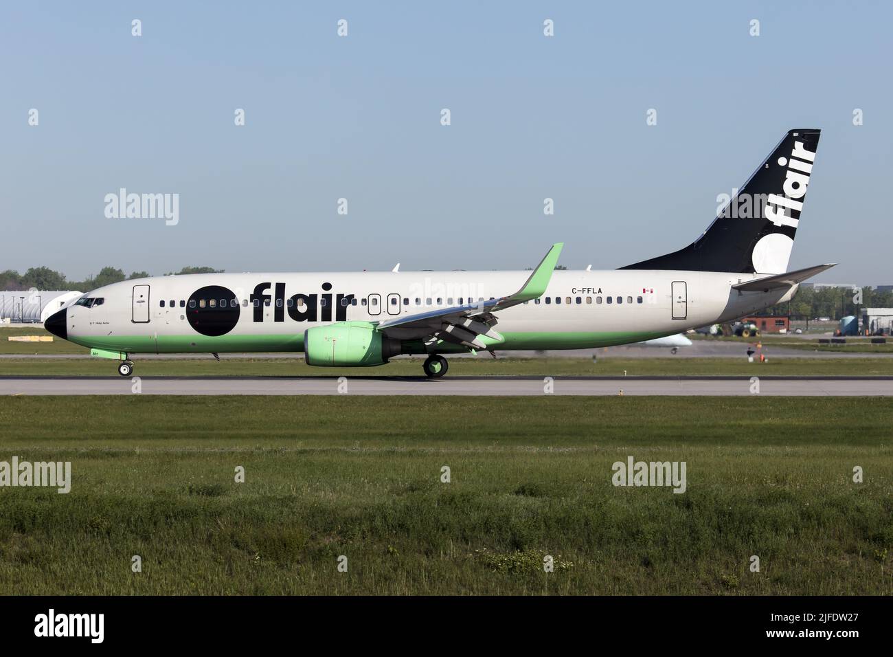 A Flair Airlines Boeing 737-8 just landed at Montreal Pierre Elliott Trudeau Int'l Airport. Flair Airlines is a Canadian low-cost airline headquartered in Edmonton, Alberta, with its main operating base at Edmonton International Airport. Stock Photo