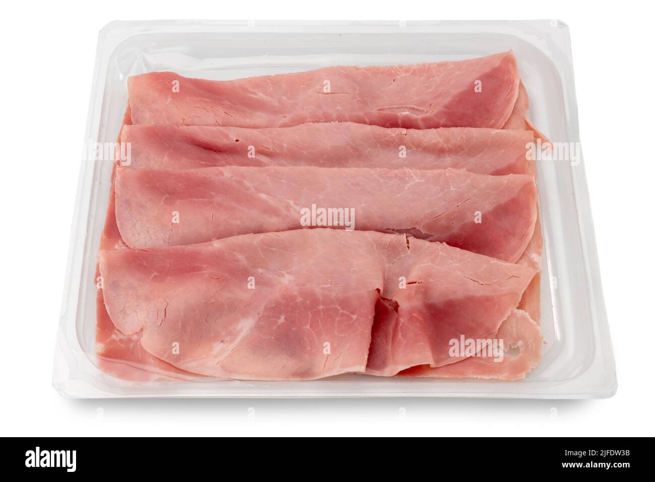 Slices of cooked ham in plastic food tray for sale in supermarket, Top view isolated on white with clipping path included. Stock Photo