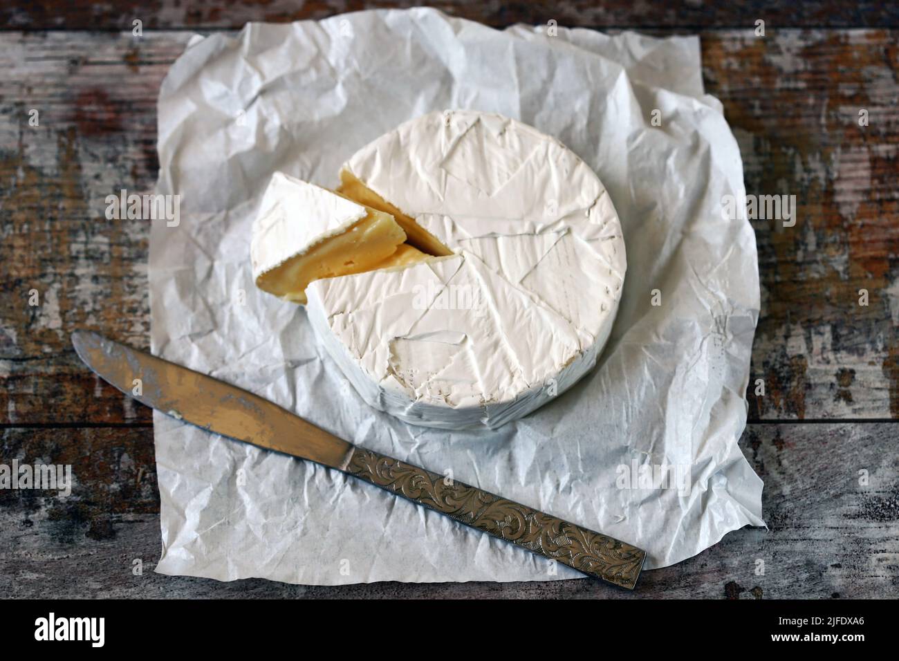 Camembert on rustic wooden background Stock Photo