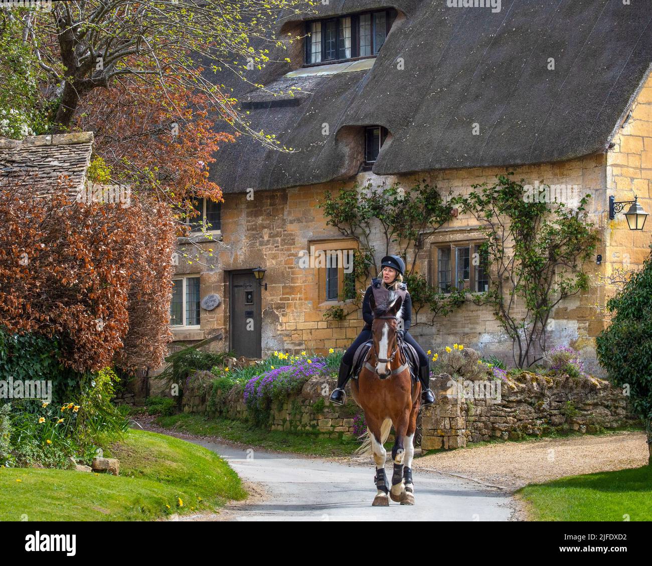 Gloucestershire, UK April 11th 2022 A horse rider with a beautiful