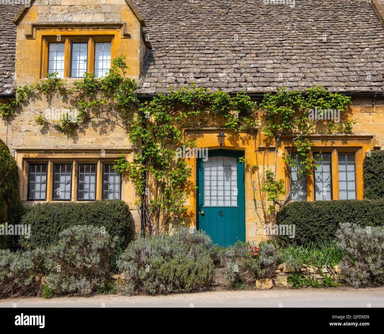 Cotswolds, UK April 11th 2022 Beautiful facade of a cottage in the Cotswold village of