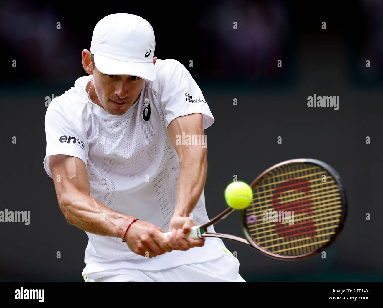 Alex de Minaur in action during his Gentlemen's Singles third round match against Liam Broady during day six of the 2022 Wimbledon Championships at the All England Lawn Tennis and Croquet Club, Wimbledon. Picture date: Saturday July 2, 2022. Stock Photo