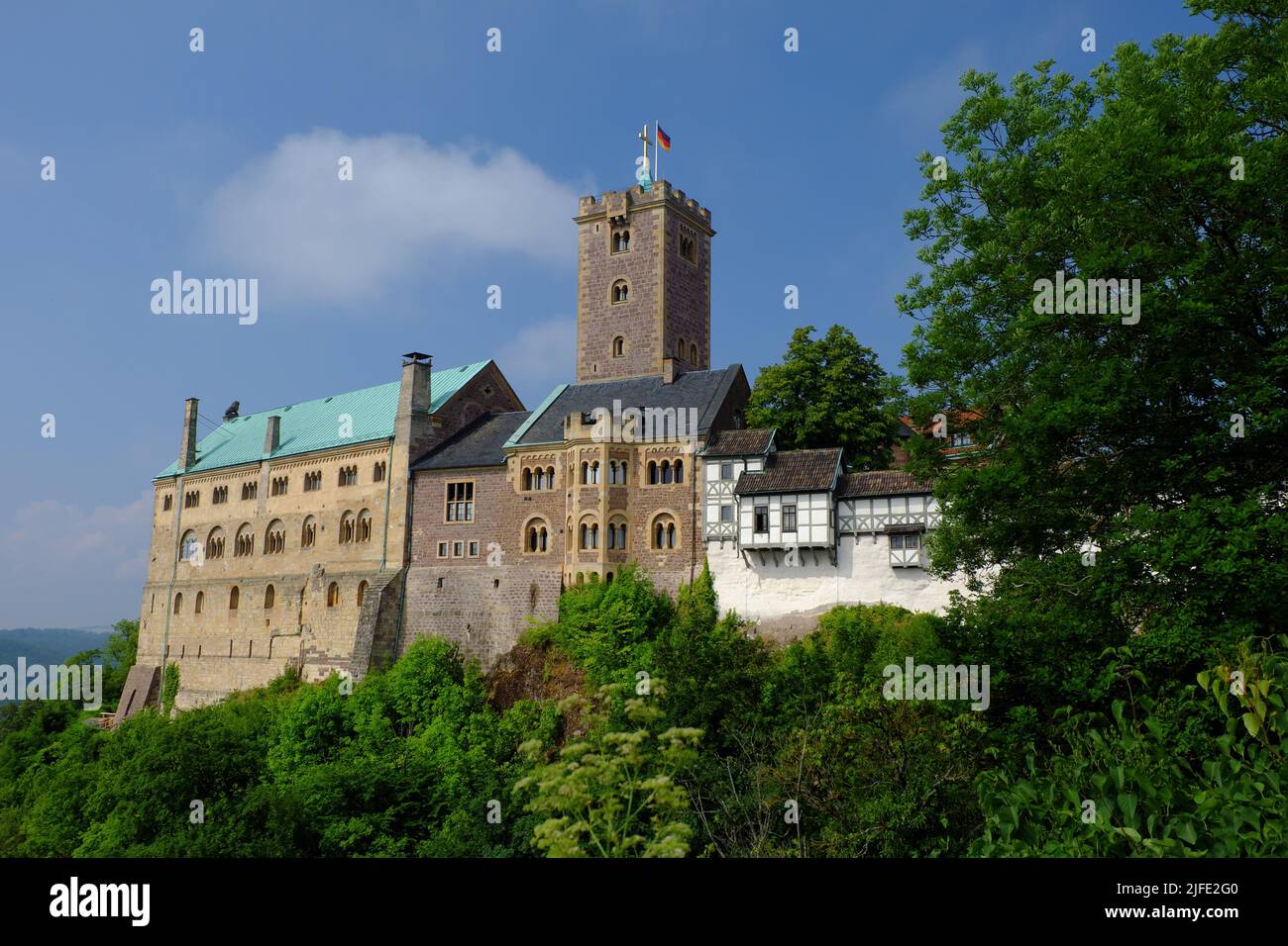 The Wartburg in Eisenach is a medieval castle famous as the place where Martin Luther translated his edition of the Bible into German. Stock Photo