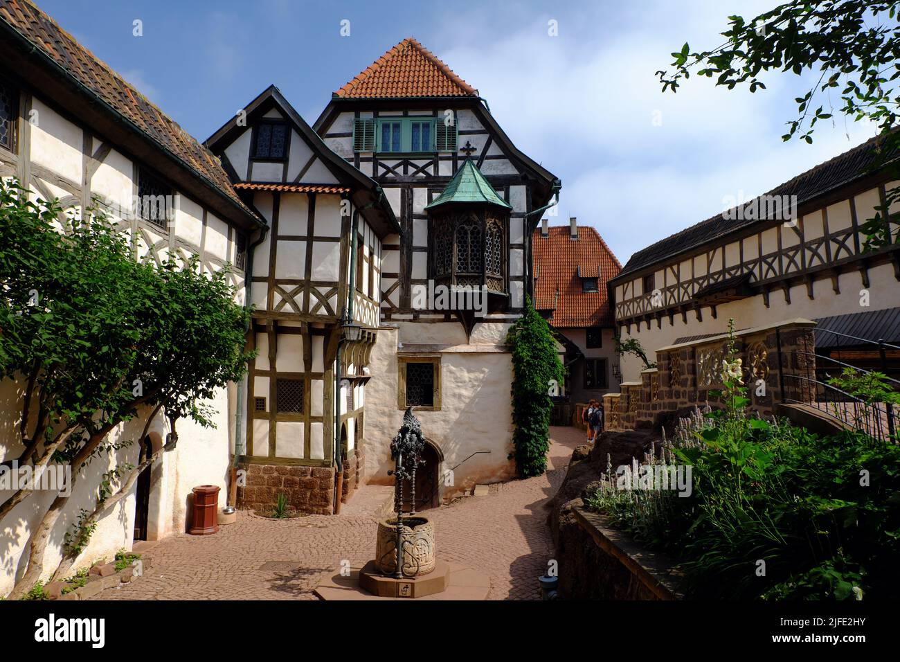 The Wartburg in Eisenach is a medieval castle famous as the place where Martin Luther translated his edition of the Bible into German. Stock Photo
