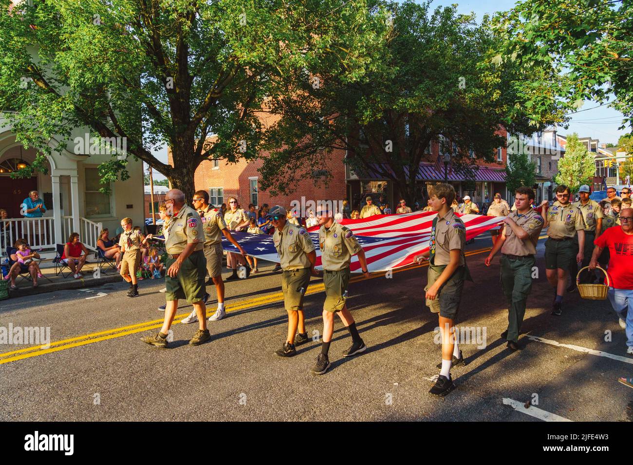 Lititz, PA, USA July 1, 2022 Boy Scouts carry a large US Flag in the