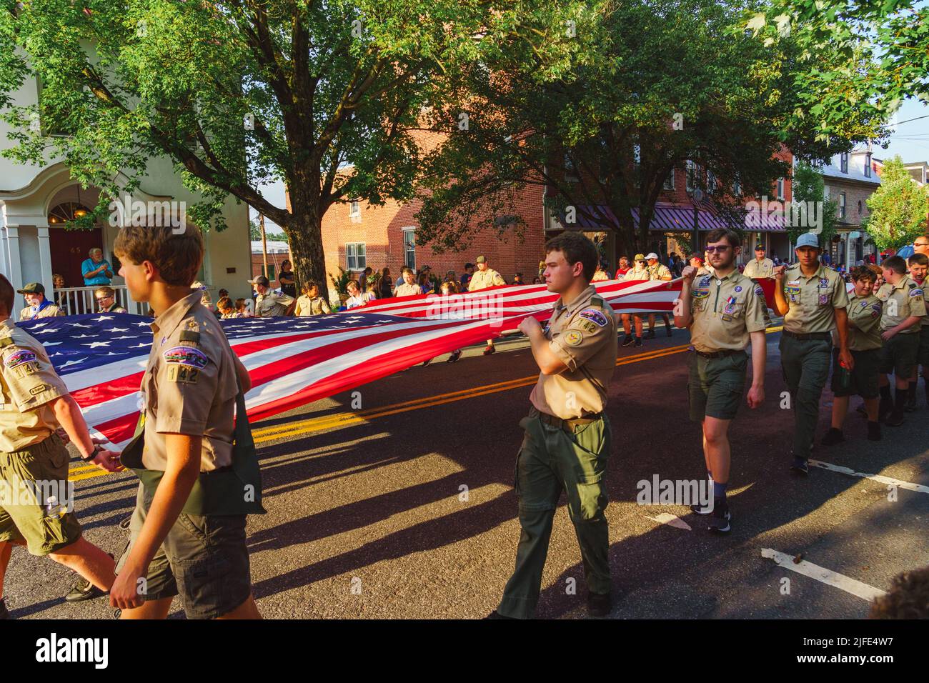 Lititz, PA, USA July 1, 2022 Boy Scouts carry a large US Flag in the