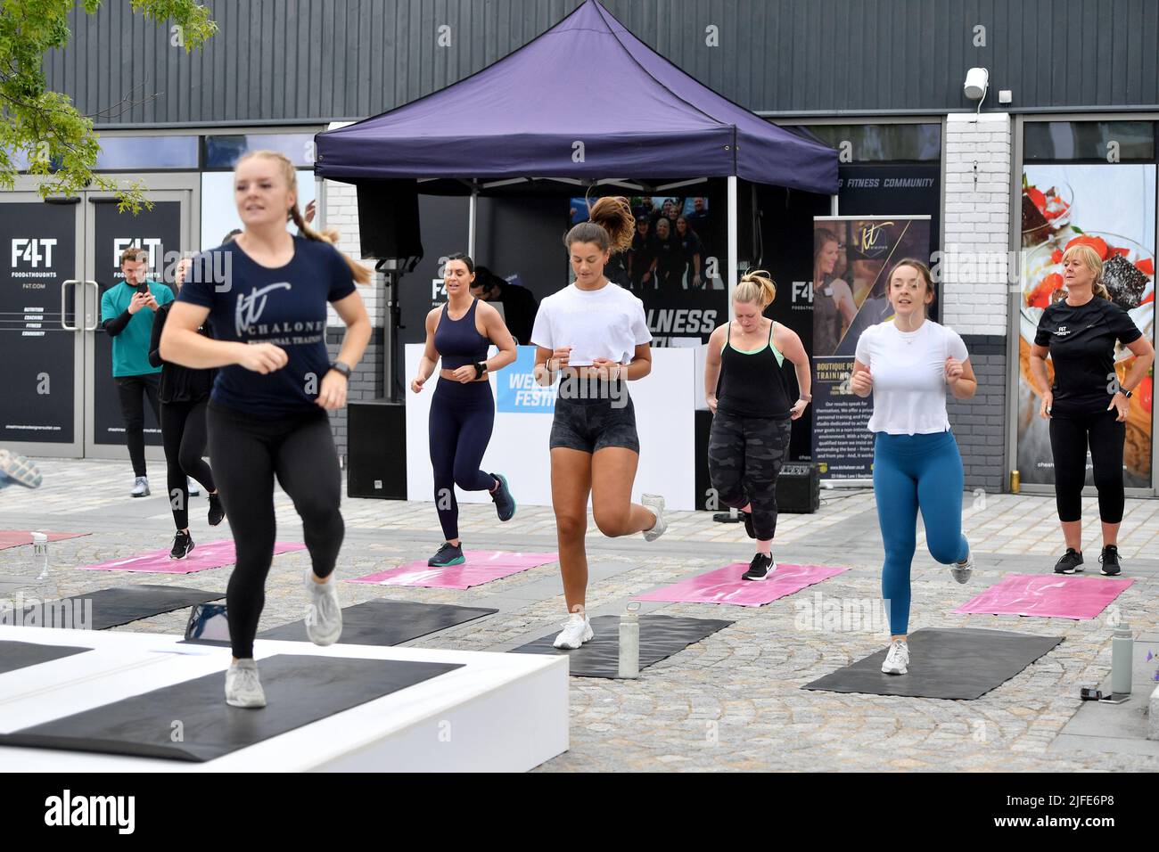 EDITORIAL USE ONLY Lululemon host a fitness session at the McArthurGlen Designer Outlet Cheshire Oaks & Food4Thoughts Wellness Festival, a weekend of fitness classes, live music and wellness workshops led by industry experts. Issue date: Saturday July 2, 2022. Stock Photo