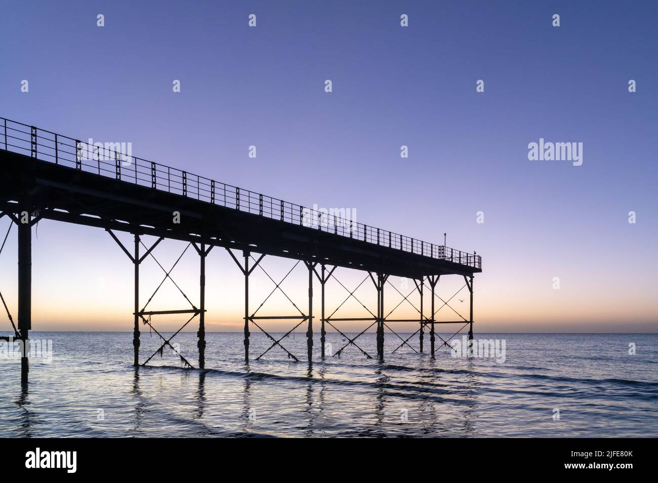 Historic Bognor Pier at dawn in West Sussex Stock Photo