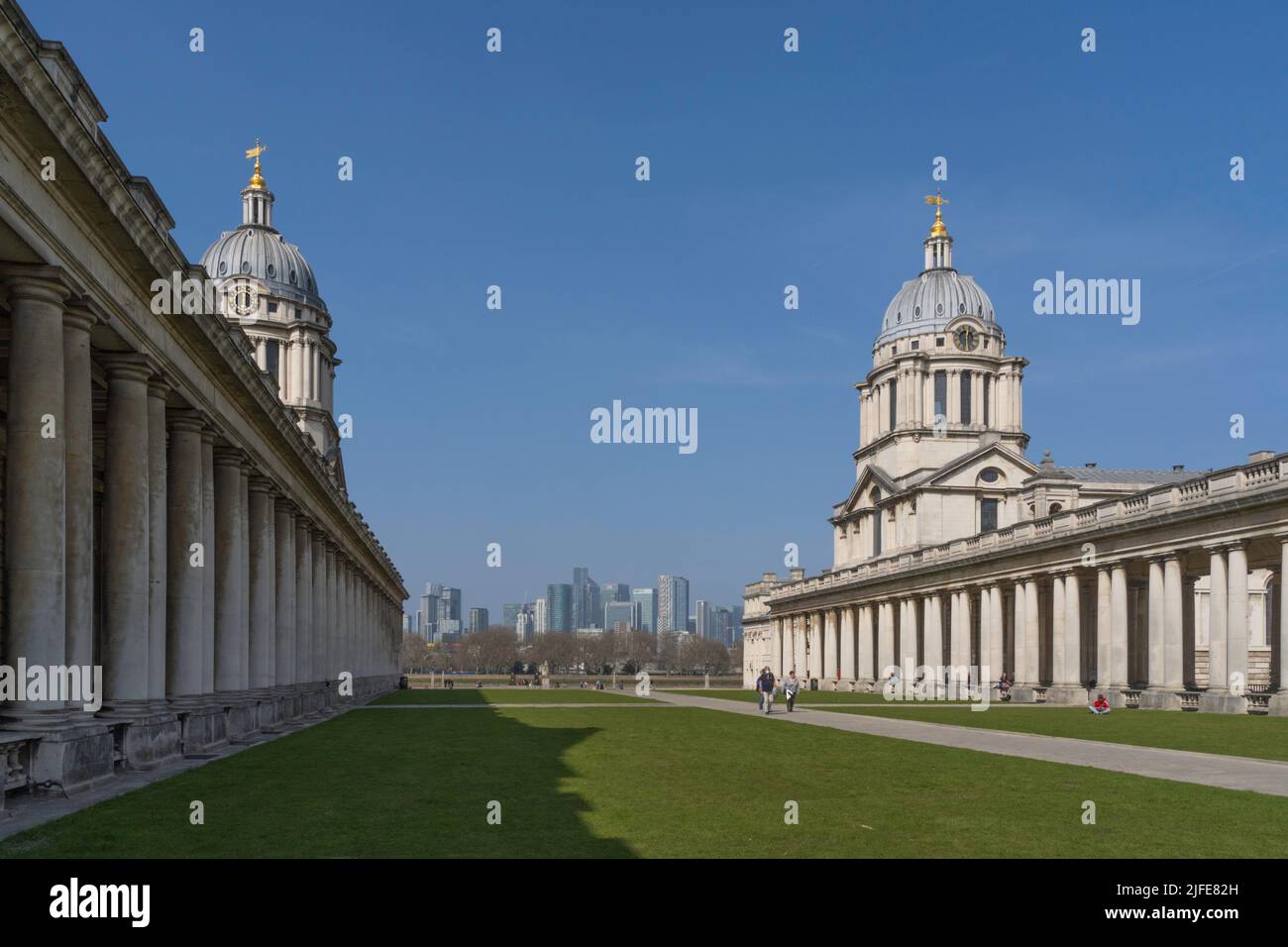 University of Greenwich with Canary wharf in the distance on a blue sky spring day in London. Stock Photo