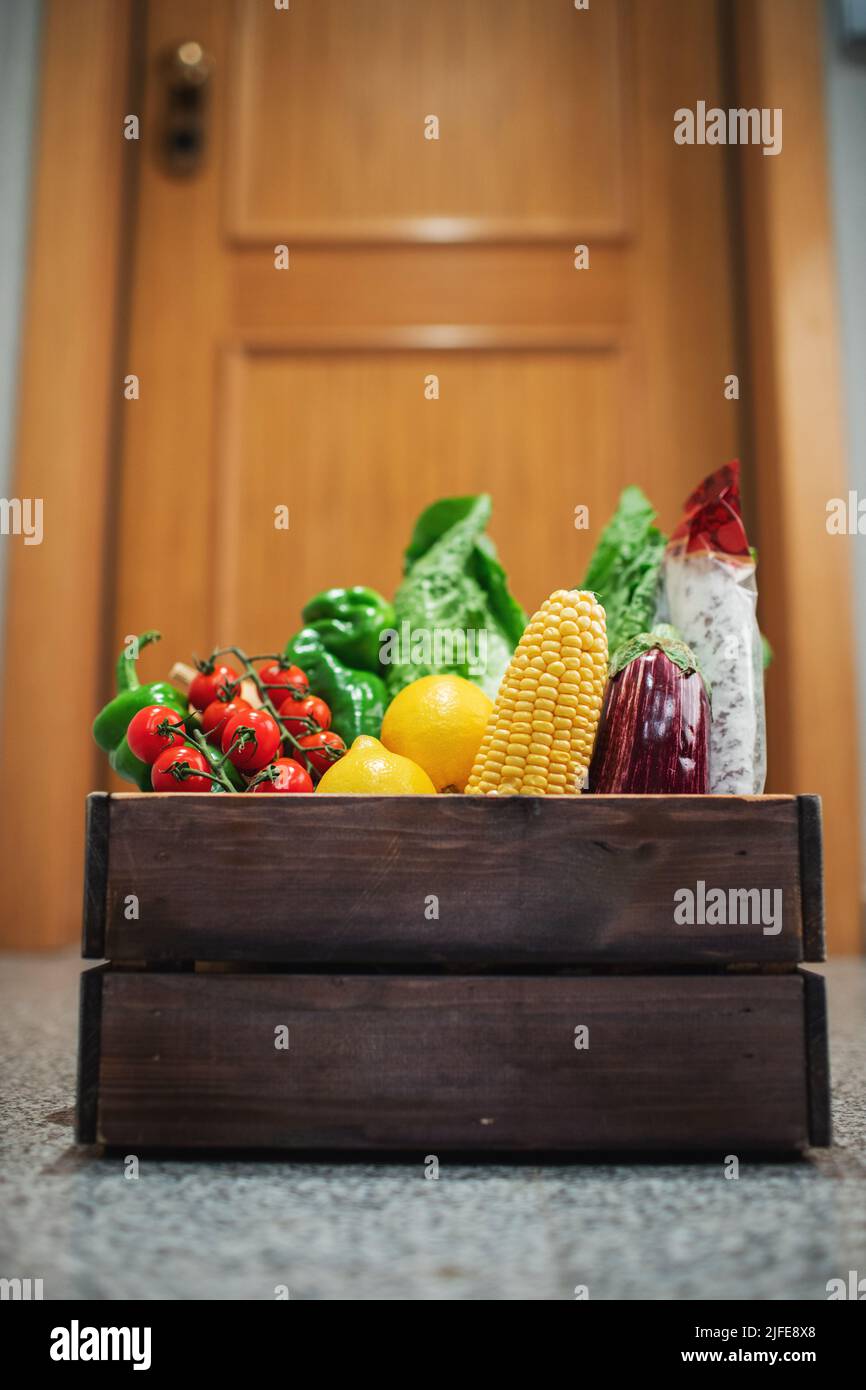 Food shopping box stand at the door of the house or apartment