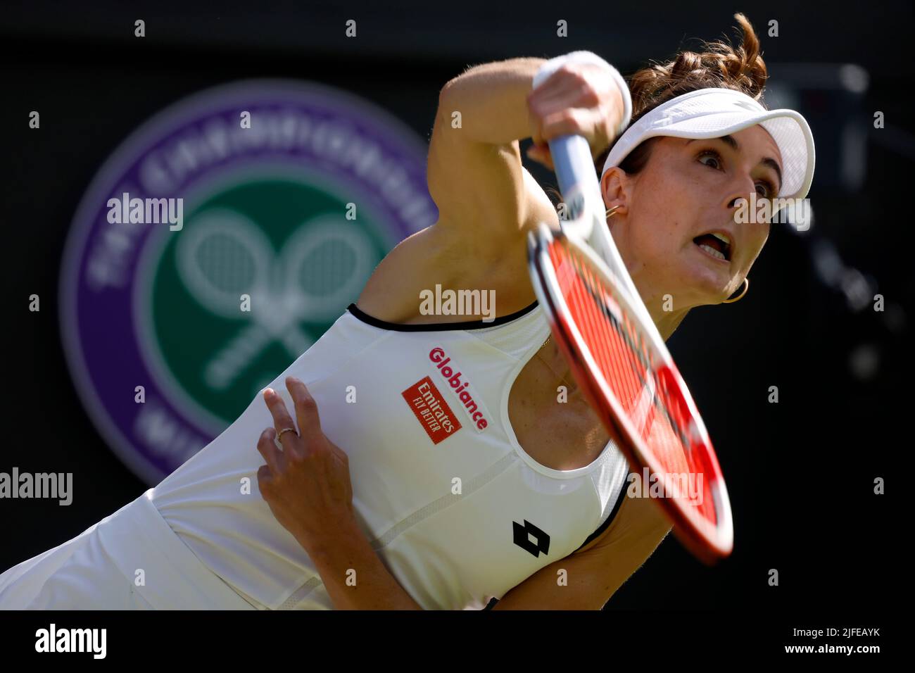 Alize Cornet in action during her Ladies’ Singles third round match against Iga Swiatek during day six of the 2022 Wimbledon Championships at the All England Lawn Tennis and Croquet Club, Wimbledon. Picture date: Saturday July 2, 2022. Stock Photo