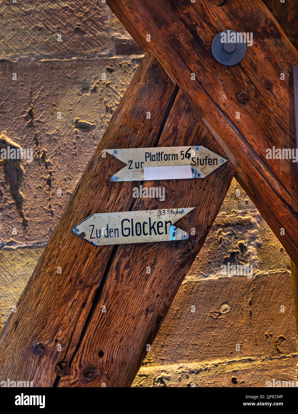 Wooden beams of the bell cage in Freiburg Minster with signposts to the bells. Baden Wuerttemberg, Germany, Europe Stock Photo