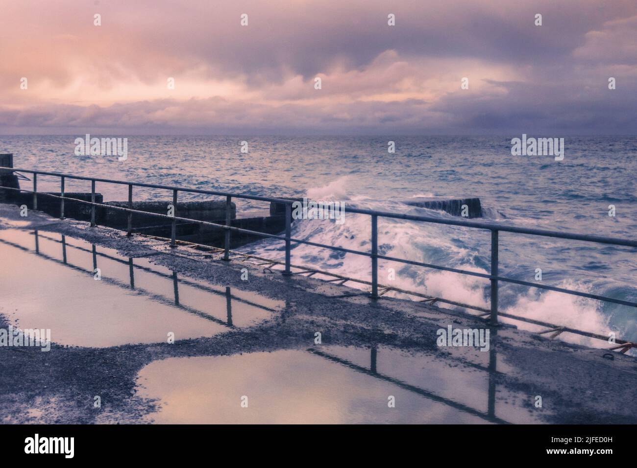 Black Sea in rainy stormy weatherin spring at sunset. Alupka, Crimea Stock Photo