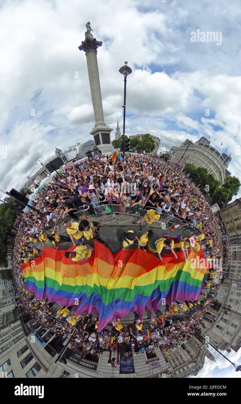London, UK. 2nd July, 2022. Giant rainbow flag passing Trafalgar Square at the Pride in London Parade. More than 30,000 participants took part in the Pride Parade in London, celebrating 50 years of Pride and LGBT  protest. Credit: Paul Brown/Alamy Live News Stock Photo