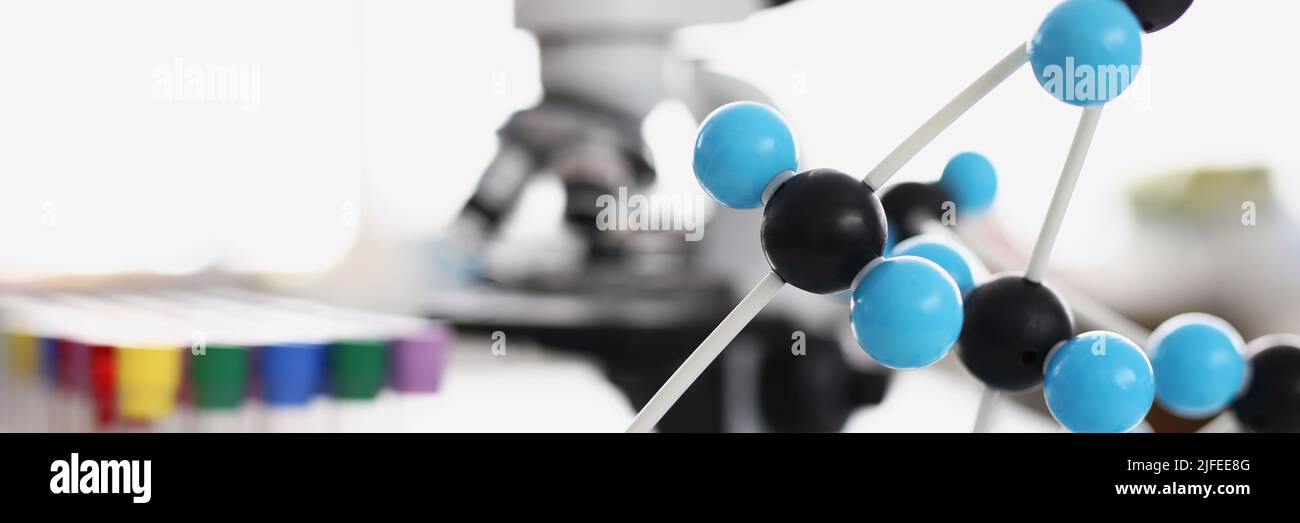 Glass tubes with colourful covers Stock Photo - Alamy