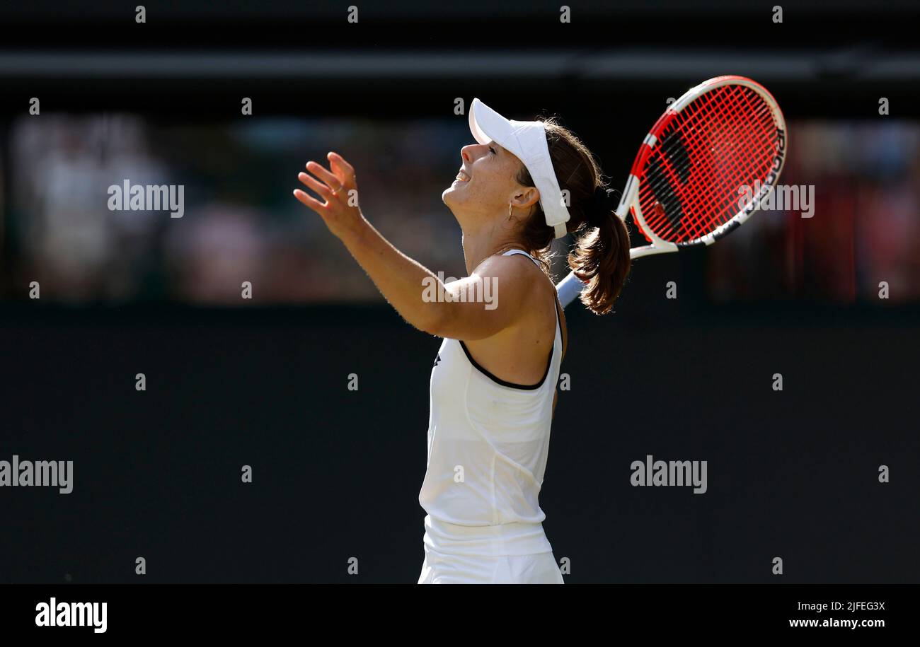 Alize Cornet celebrates winning her Ladies' Singles third round match against Iga Swiatek during day six of the 2022 Wimbledon Championships at the All England Lawn Tennis and Croquet Club, Wimbledon. Picture date: Saturday July 2, 2022. Stock Photo