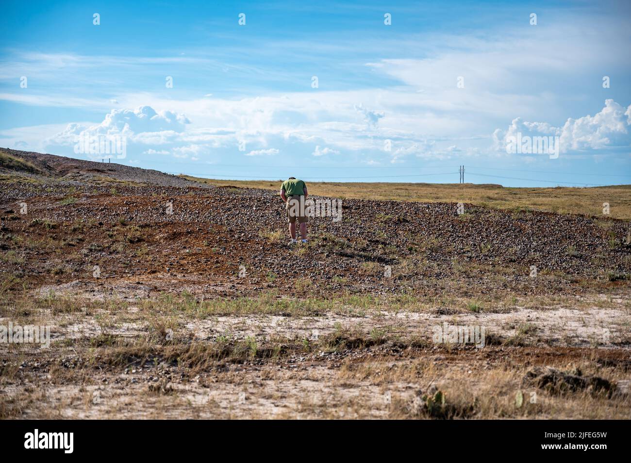 Lone individual collecting rocks in the wakonda agate beds in the