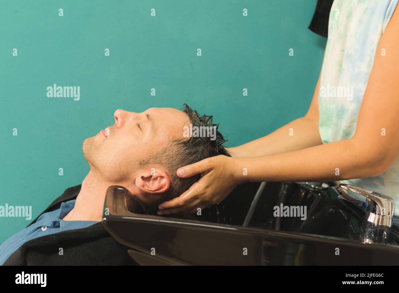 massage after head washing for men Stock Photo Alamy
