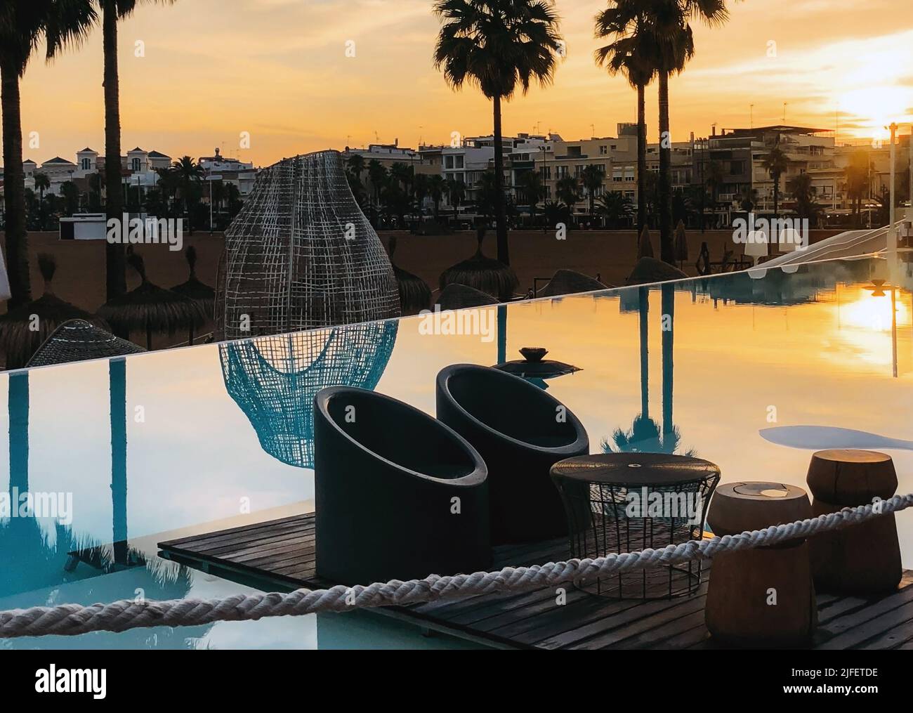 Luxury swimming pool on the beach Stock Photo