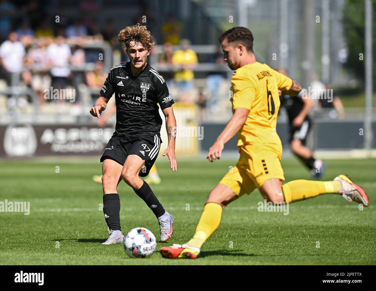 Eupen's Lorenzo Offerman and Aachen's Frederic Baum fight for the ball during a friendly soccer match between KAS Eupen and Alemannia Aachen, Saturday 02 July 2022 in Eupen, to prepare the 2022-2023 'Jupiler Pro League' first division of the Belgian championship. BELGA PHOTO JOHN THYS Stock Photo