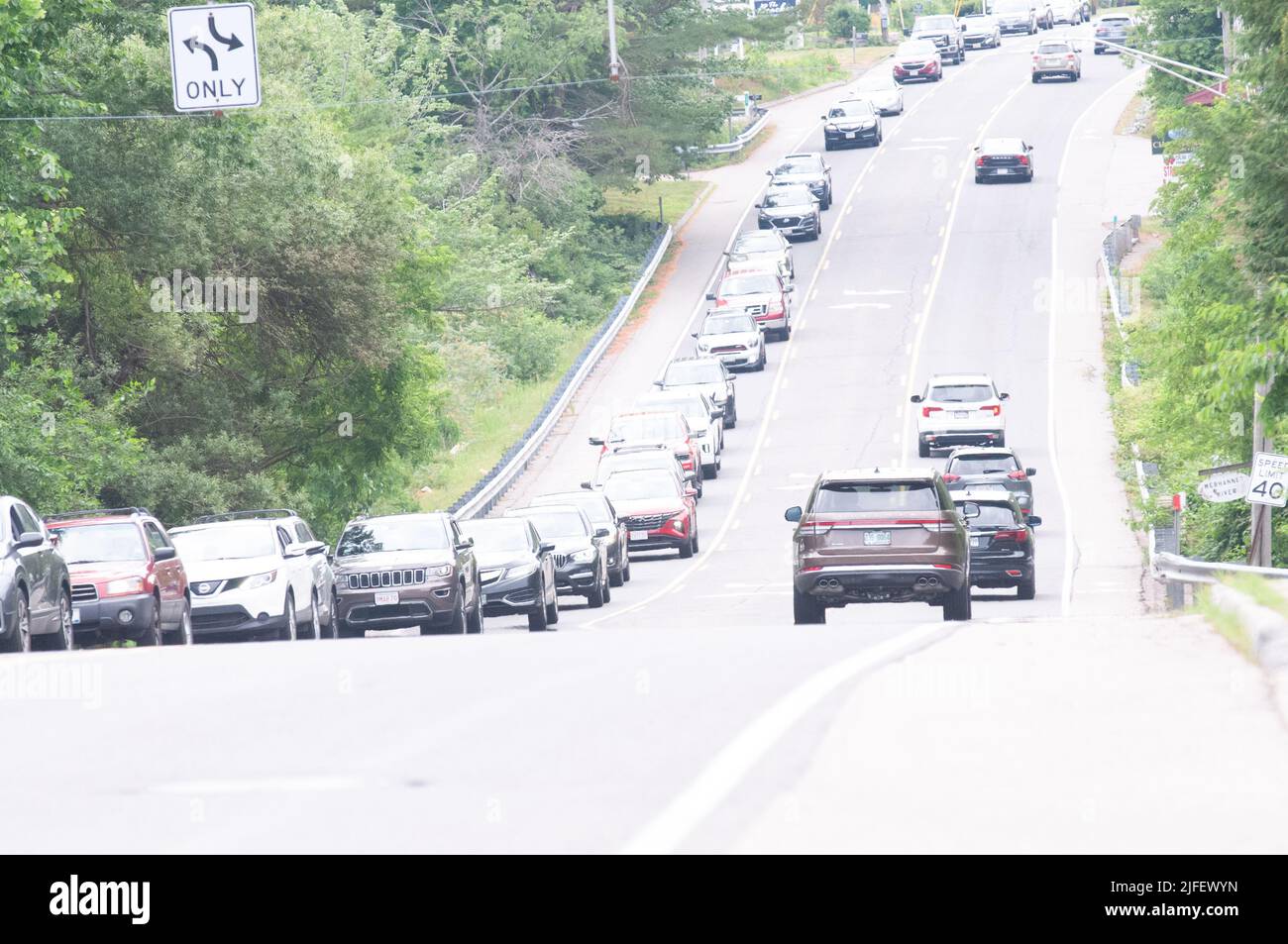 . Early morning traffic on Route 1, Post Road in Wells, ME. U.S.A,. everyone is lining up and heading for the beaches. with no worry of high gas price. Stock Photo