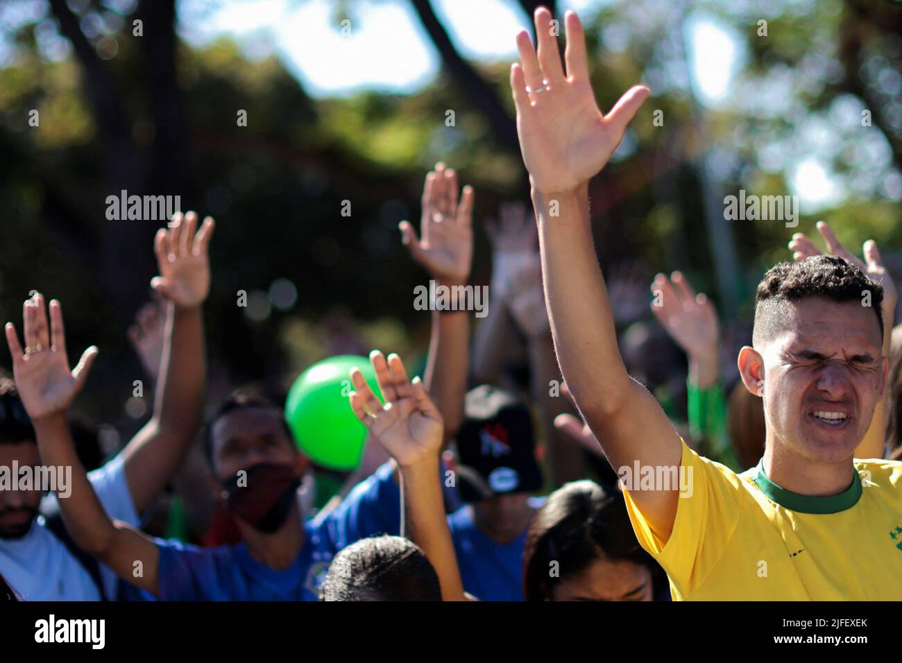 People pray during an Evangelical March for Jesus in Brasilia, Brazil July 2, 2022. REUTERS/Ueslei Marcelino Stock Photo