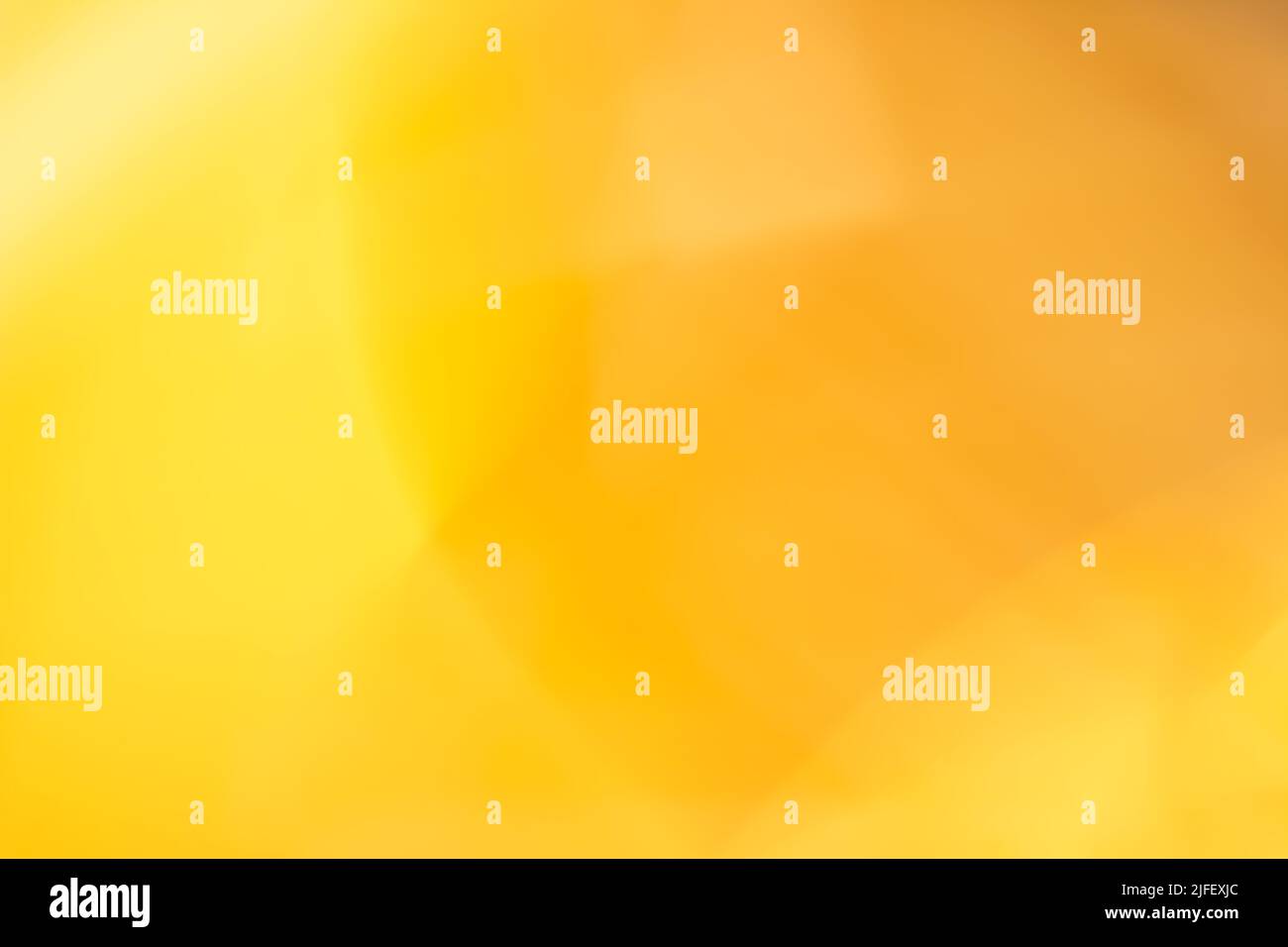 Yellow orange abstract background, smooth gradient, breaks and highlights. Backdrop Stock Photo