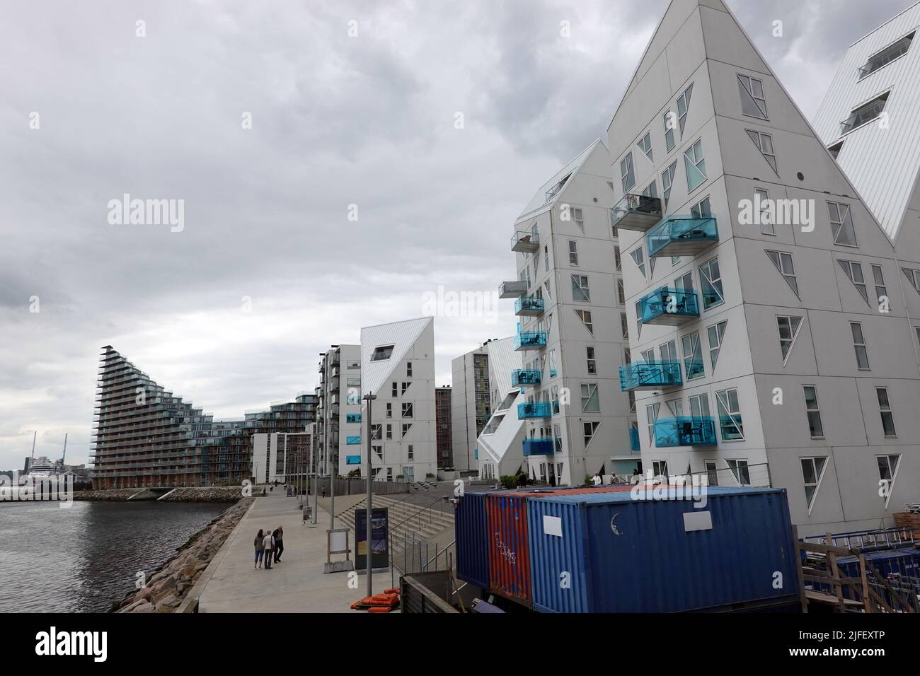 Aarhus, Denmark. 10th June, 2022. Residential buildings in the new Aarhus Ø district with the striking 'Isbjerget' (iceberg, r) structure. Credit: Kathrin Deckart/dpa/Alamy Live News Stock Photo