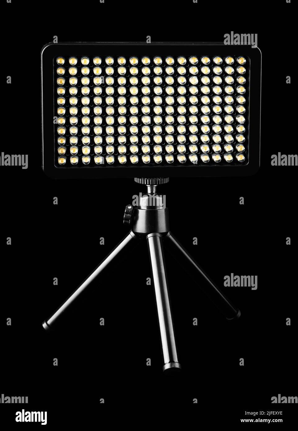 flashlight searchlight for video filming on a black background Stock Photo