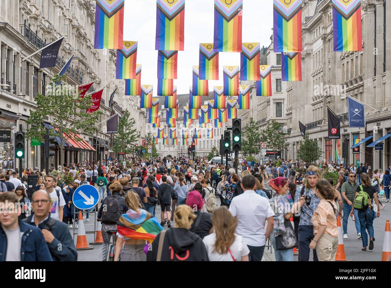 London Pride parade celebrating the 50th anniversary of the LGBTQ event. View down Regent street with the roads full of people, Selective focus. 2022 Stock Photo