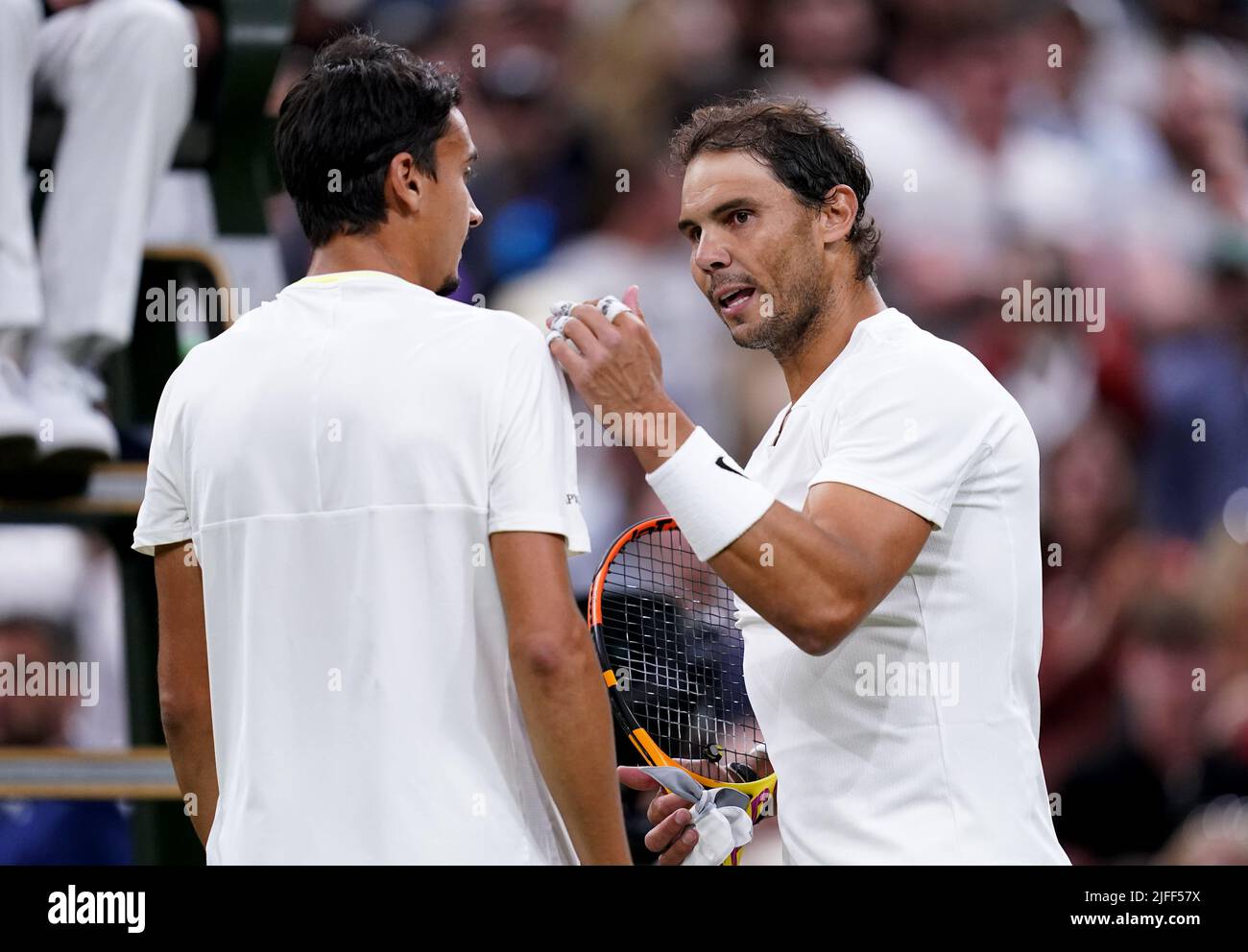 Rafael Nadal (right) and Lorenzo Sonego speak after their GentlemenÕs