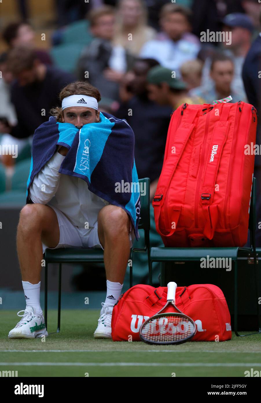 Stefanos Tsitsipas as the roof is closed in the fourth set during his Men's Singles third round match against Nick Kyrgios during day six of the 2022 Wimbledon Championships at the All England Lawn Tennis and Croquet Club, Wimbledon. Picture date: Saturday July 2, 2022. Stock Photo