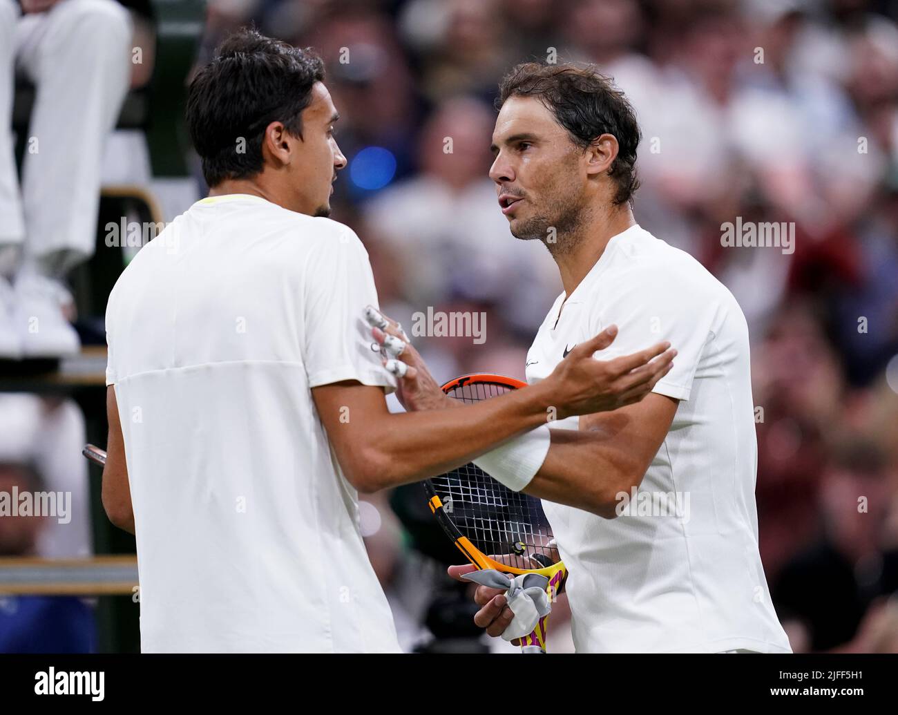 Rafael Nadal (right) and Lorenzo Sonego speak after their GentlemenÕs
