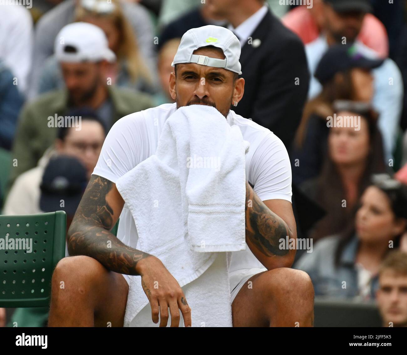 London, Gbr. 02nd July, 2022. London Wimbledon Championships Day 6 02/07/2022 NICK KYRIGOS (AUS) ponders his next move after he exchanges verbals with umpire and Tournament Supervisor Anders Egli during his third round match against Stefanos Tsitsipas Credit: Roger Parker/Alamy Live News Stock Photo